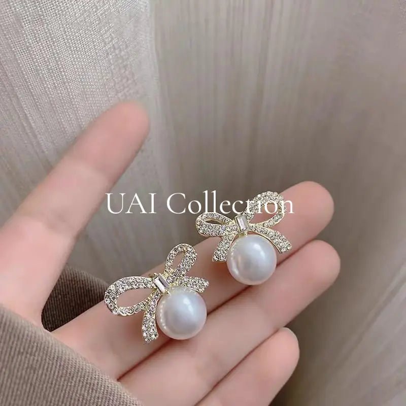 Bow Design Pearl Stud Earrings - Uai Collection