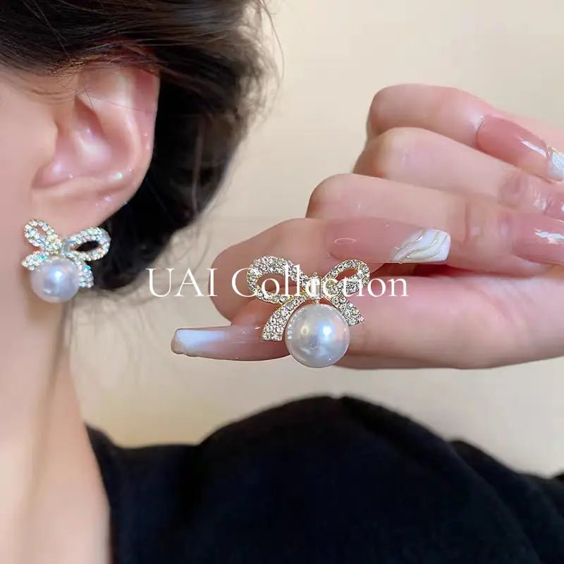 Bow Design Pearl Stud Earrings - Uai Collection